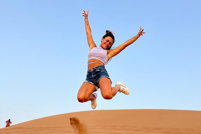 Dubai: Desert Safari 4x4 Dune with Camel Riding and Sandboarding - Timing, clothing, and the cancellation rule