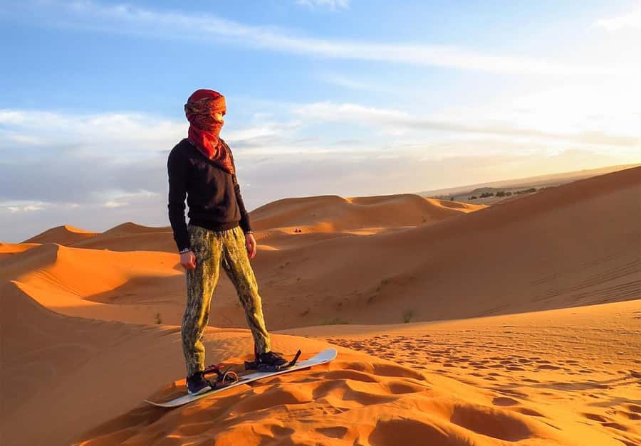 Dubai: Desert Safari, Camel Ride, Sandboard & Buffet Dinner - Seven hours of desert adventure from Dubai