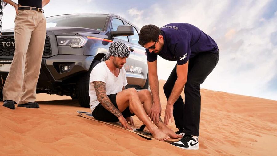 Dubai Desert Safari - Camel Ride, Sandboarding & 30 Min Quad - The highest dune, sandboarding, and photo time