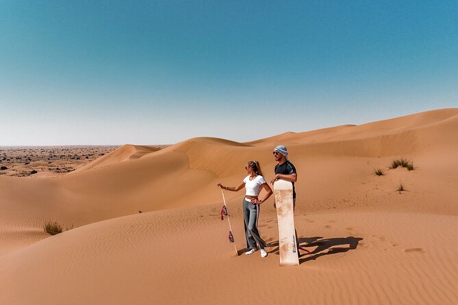 Dubai Desert Safari: Camel Ride, Sandboarding, BBQ & House Drinks - From Dubai hotels to open desert
