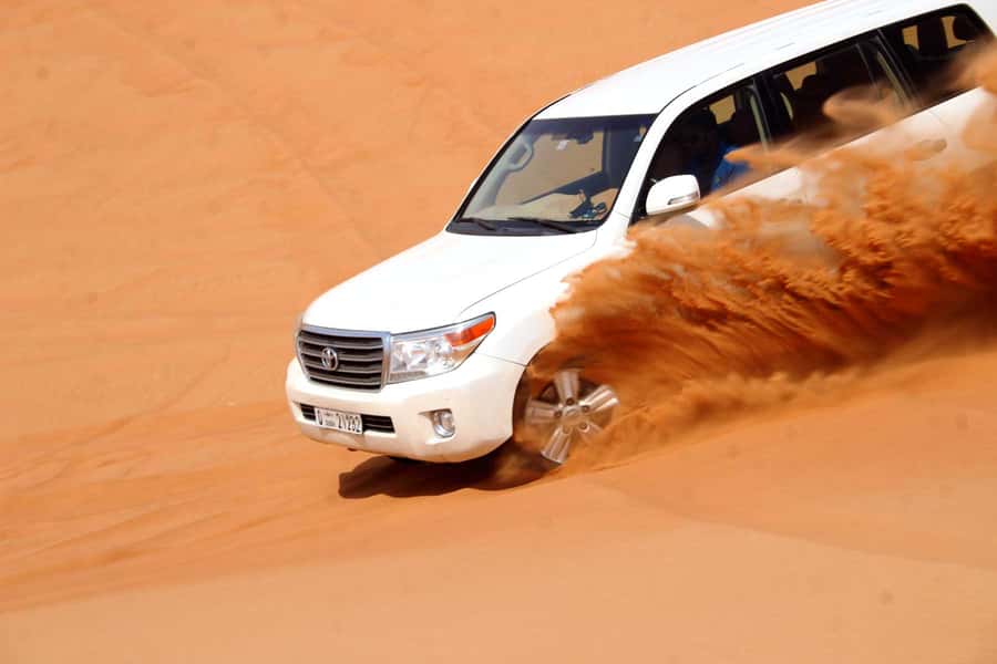 Dubai: Desert Safari, Camel Ride, Sandboarding, Quad Bike - The camel ride: traditional, brief, and worth understanding