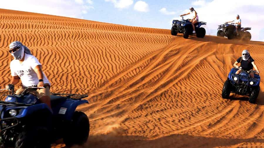 Dubai: Desert Safari, Camel Ride, Sandboarding, Quad Bike - How the guides shape the day