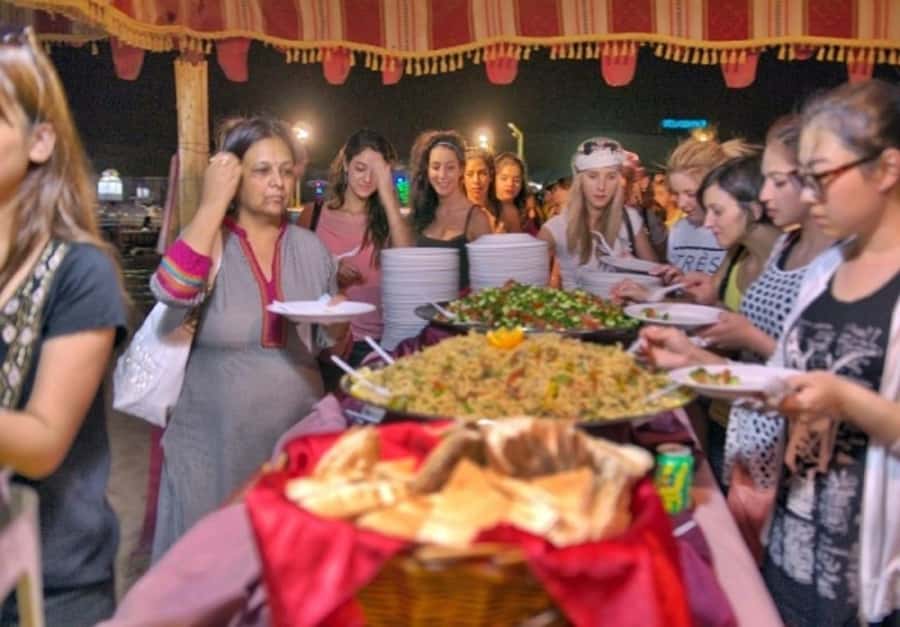Dubai: Desert Safari Camel Riding, Sandboarding & BBQ Dinner - Sandboarding with time for desert photos