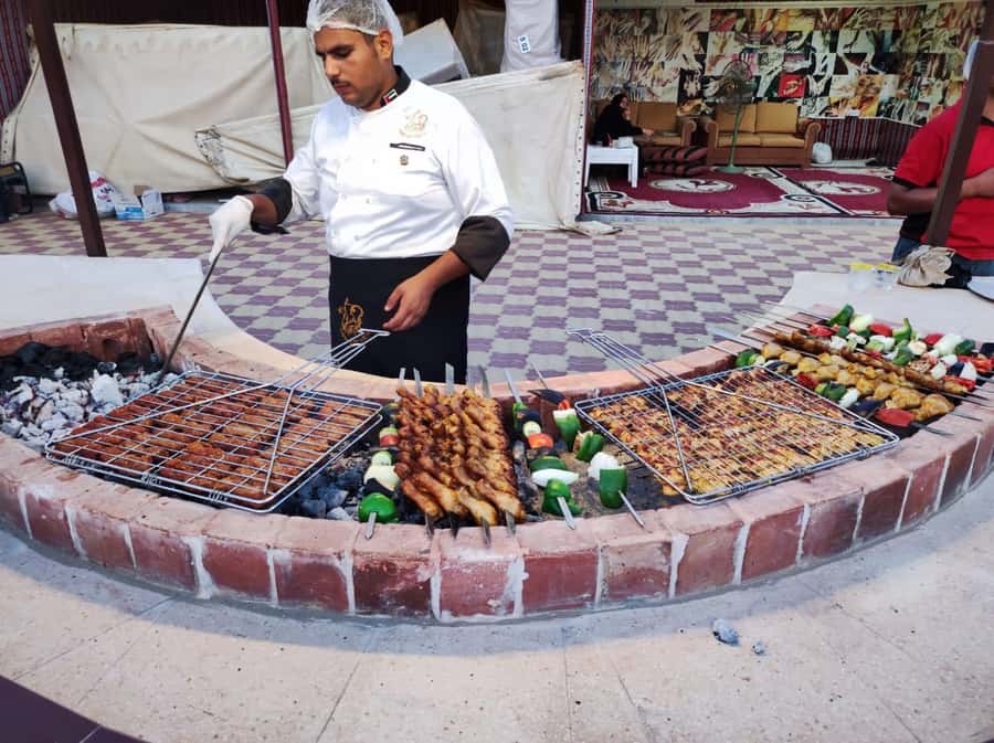 Dubai: Desert Safari Camel Riding, Sandboarding & BBQ Dinner - BBQ dinner and four kinds of entertainment