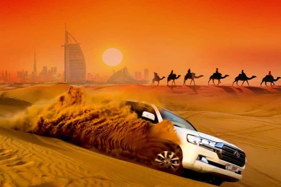 Dubai: Desert Safari Camel Riding, Sandboarding & BBQ Dinner - First stop: tyre pressure, falcons, and optional quad biking