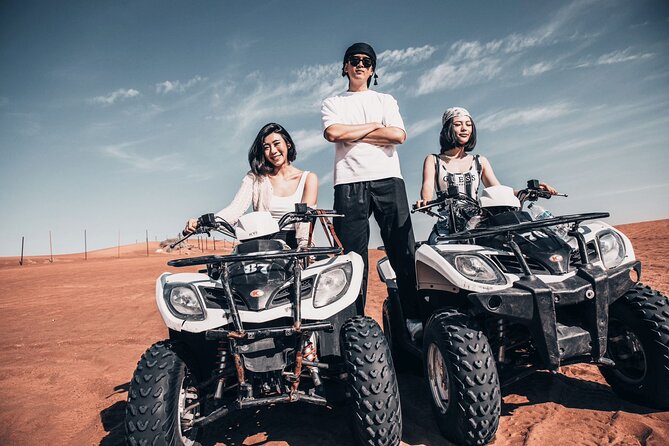 Dubai Desert Safari: Dune Bashing, Camel Ride & BBQ Dinner - Sandboarding and the photo stop
