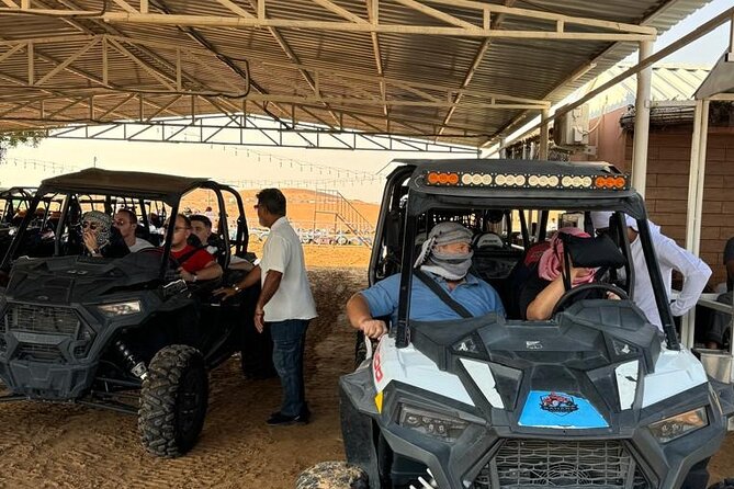 Dubai Desert Safari Dune Bashing, Camel Ride, Sandboarding & BBQ - The Bedouin-style camp after sunset