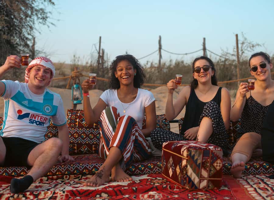 Dubai: Desert Safari, Quad Bike, Camel Ride & Al Khayma Camp - Sunset, dinner, and evening entertainment