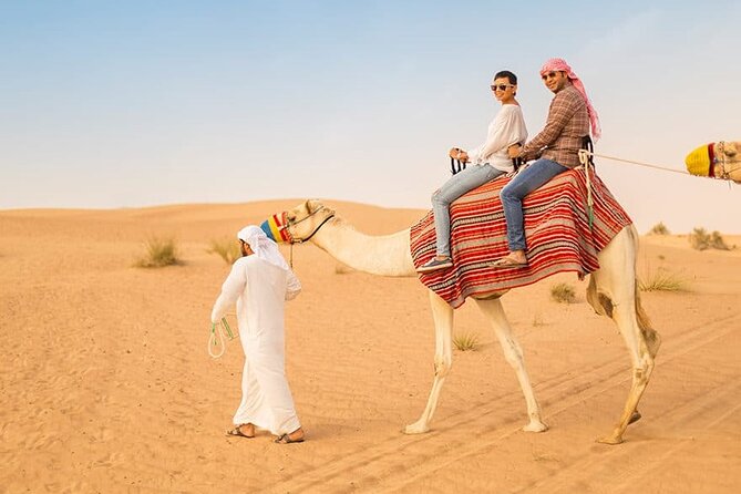 Dubai Desert Safari: Quad Bike, Camel Ride and BBQ Dinner - Quad bikes, sunset views, and sandboarding