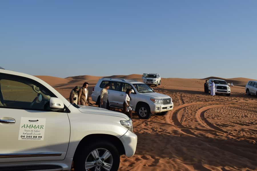Dubai: Desert Safari, Quad Bike, Camel Ride and Sandboarding - The high-dune photo stop at sunset