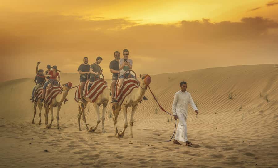 Dubai: Desert Safari, Quad Bike, Sandboarding, Camels & BBQ - Dune bashing is the main burst of adrenaline