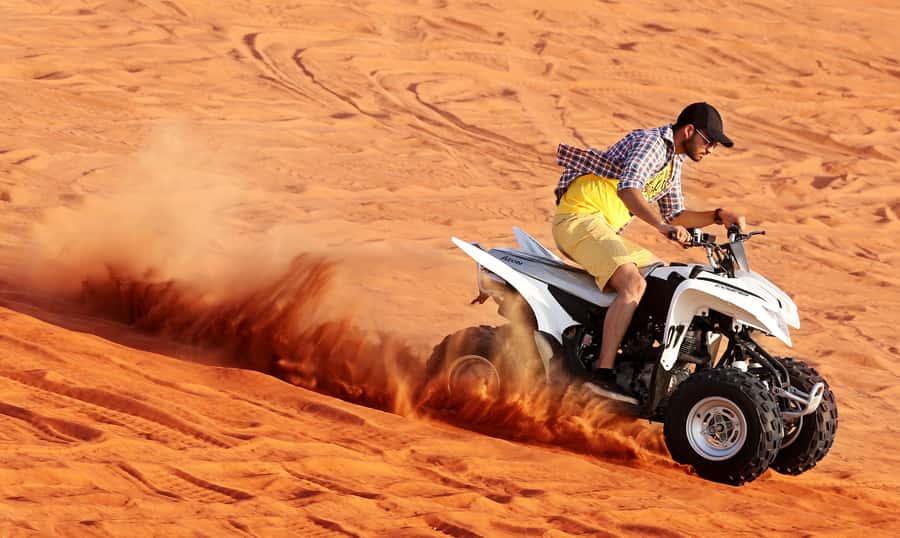 Dubai: Desert Safari, Quad Bike, Sandboarding, Camels & BBQ - Evening shows add color to the camp