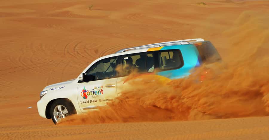 Dubai Desert Safari, Quad Biking, Camel Ride, & Sandboarding - Dune driving: the biggest burst of excitement