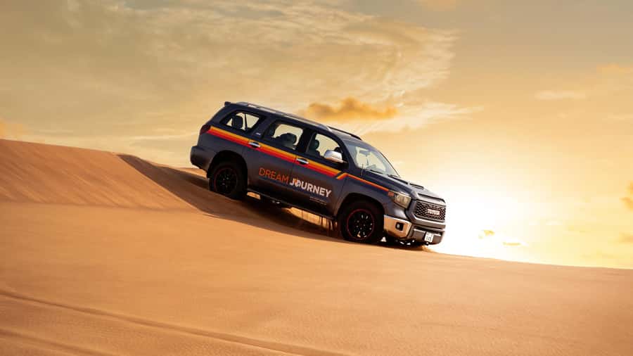 Dubai Desert Safari - Sandboarding, Quad Bike & BBQ Options - Dune bashing across Lahbab