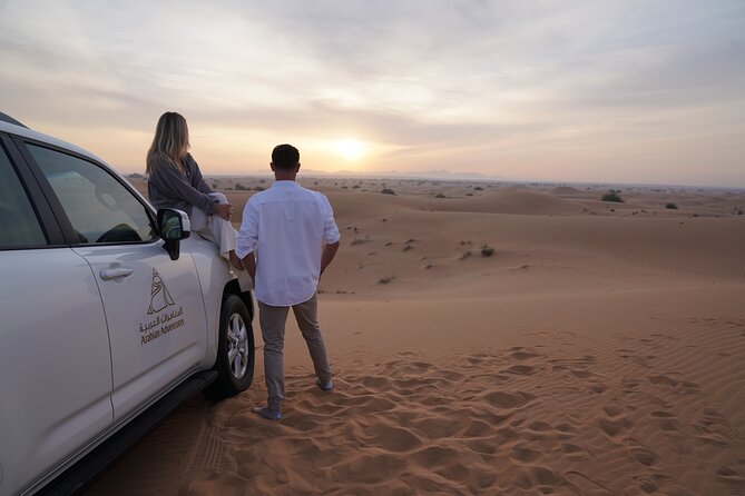 Dubai Desert Safari Thrill: Camel Ride, Live shows, BBQ & Spirits - From Dubai hotels to open desert