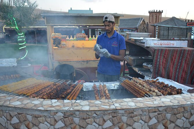 Dubai Desert safari Tour with Live BBQ & Belly Dance Shows - Tanura, belly dancing, and fire performances