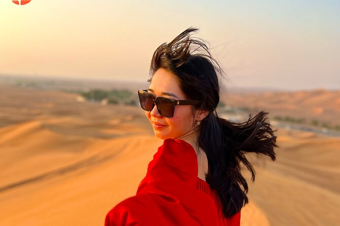 Dubai desert safari with 4x4 Dune Bashing,Camel Ride sand board - Camel riding: treat it as a photo moment