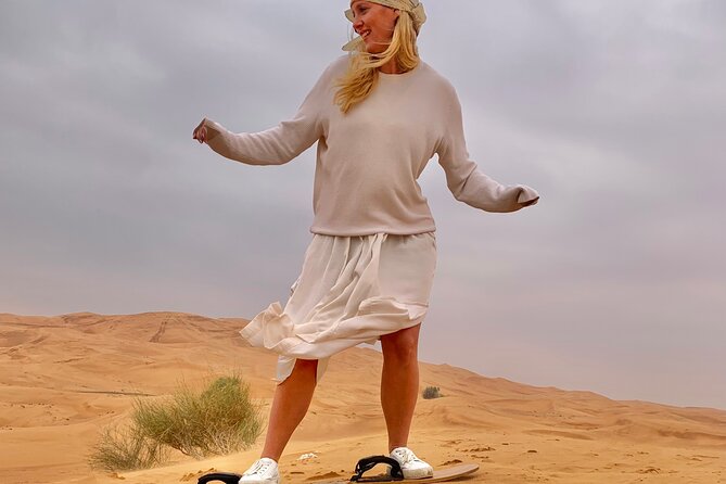 Dubai desert safari with 4x4 Dune Bashing,Camel Ride sand board - Sandboarding on the red dunes