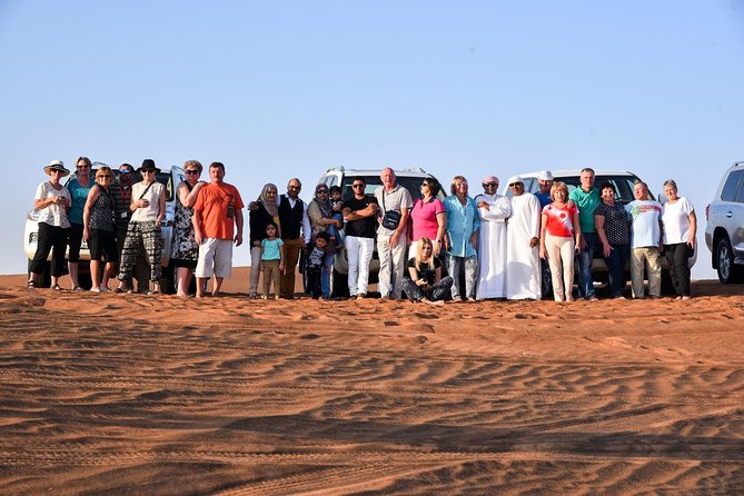 Dubai Desert Safari with BBQ and 4WD Land Cruiser Dune Bashing - Belly dancing, Tanoura, and fire after dark