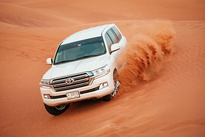 Dubai Desert Safari with BBQ Dinner and Live Shows - BBQ dinner, snacks, and included drinks