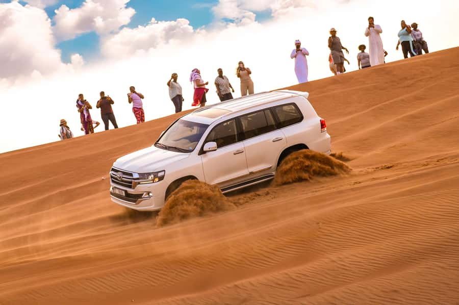 Dubai: Desert Safari with BBQ Dinner & Quad Biking Options - Red sand and a fast escape from Dubai