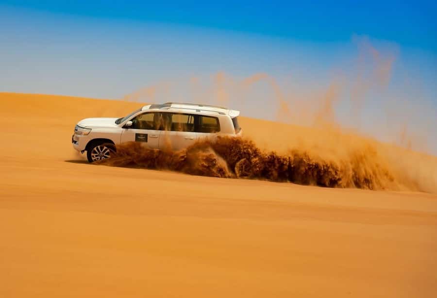 Dubai: Desert Safari with BBQ Dinner - The red dunes deliver the biggest thrill