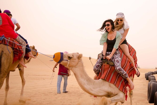 Dubai Desert Safari With Buffet Dinner Tour - Henna, shisha, and three kinds of stage entertainment