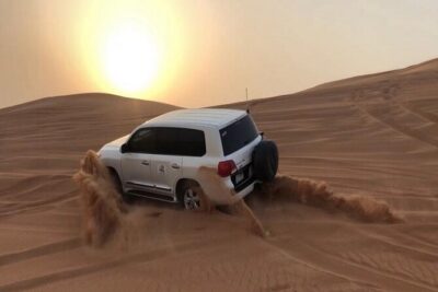 Dubai Desert Safari With Camel Ride and Sand Boarding