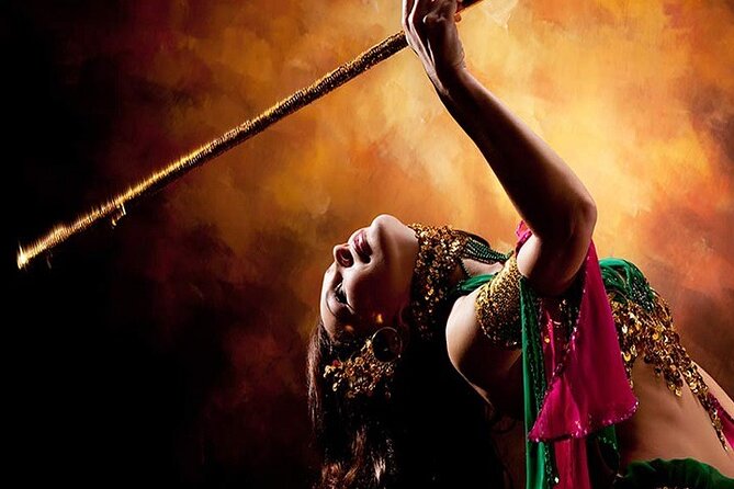 Dubai Desert Safari With Camel Ride and Sand Boarding - Belly dance, fire, and tanura performances