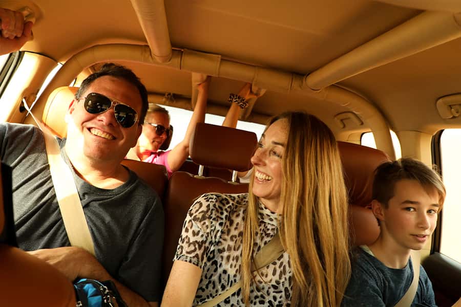 Dubai: Desert Safari with Camp, Dinner, & Optional Overnight - Sunset at a planned photo stop