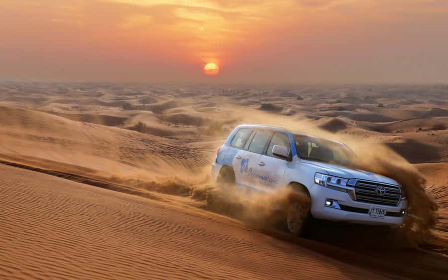 Dubai: Desert Safari with Camp, Dinner, & Optional Overnight - Dune bashing and sandboarding
