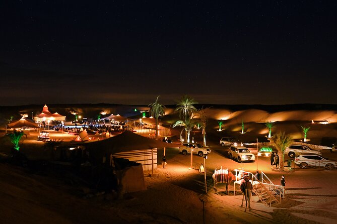 Dubai Desert Safari with Desert Camp Dinner, Camel Ride & Shows - Belly dancing, tanoura, and fire under the stars