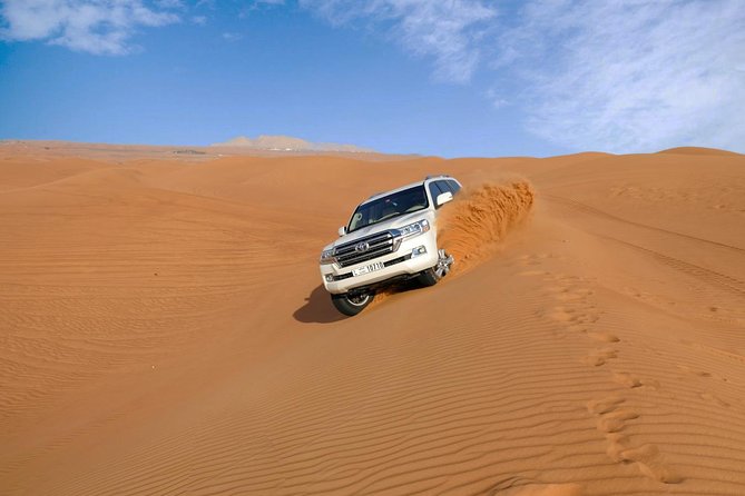 Dubai Desert Safari with Dune Bashing, Camel Rides & BBQ - Camp activities with henna, falconry, and Arabic dress