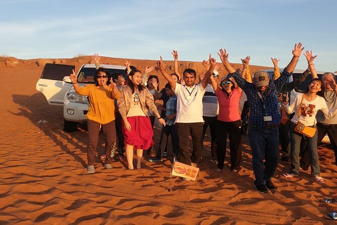 Dubai Desert Safari With Sandboarding & Camel Riding - Arabic coffee, a camel ride, and a traditional camp
