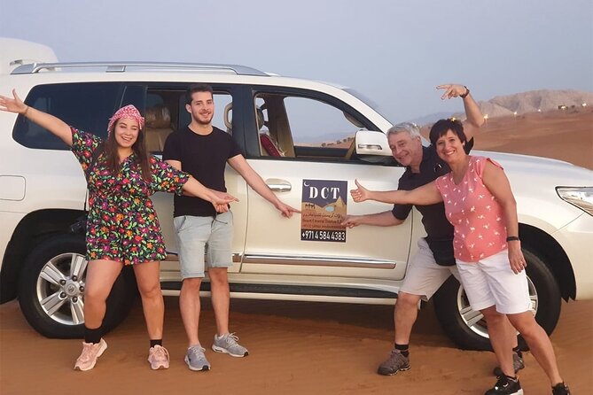 Dubai Desert Safari With Sandboarding & Camel Riding - Belly dance, Tanura, and fire shows after dark