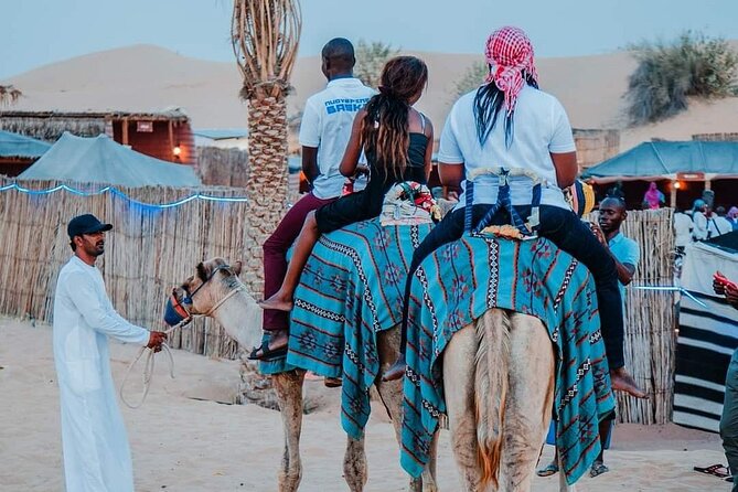 Dubai Desert Safari With Sandboarding & Camel Riding - Sandboarding and sunset photography in Lahbab
