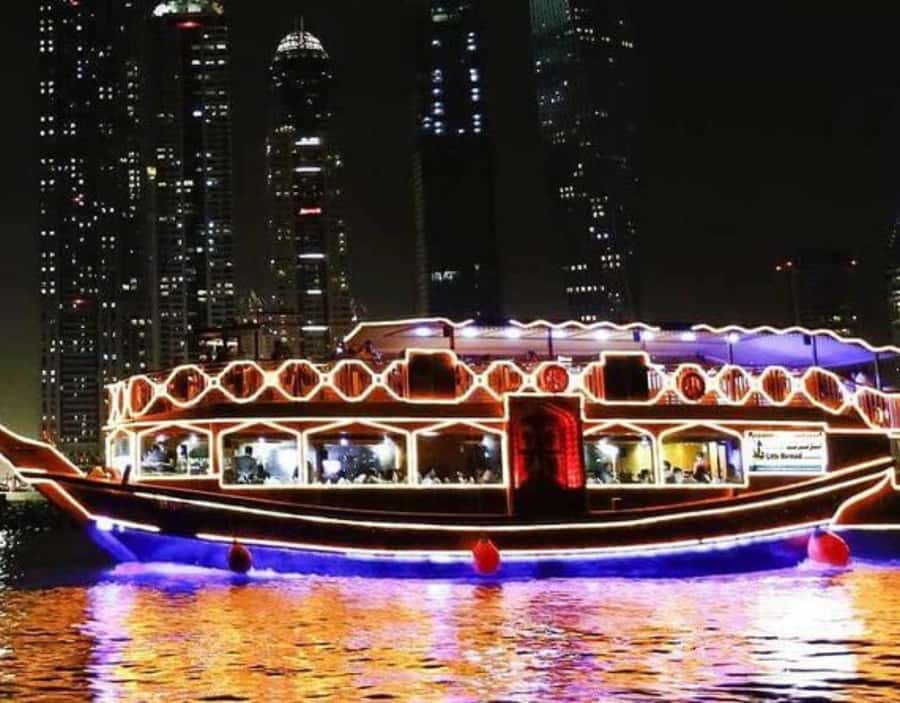 Dubai: Dhow Dinner Cruise on Creek or Marina with Live Shows - Traditional music and dance on the water