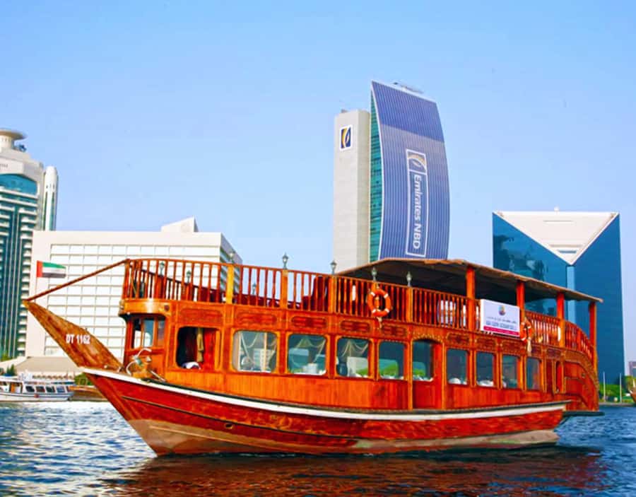 Dubai: Dhow Dinner Cruise on Creek or Marina with Live Shows - Sunset views before the city lights come on