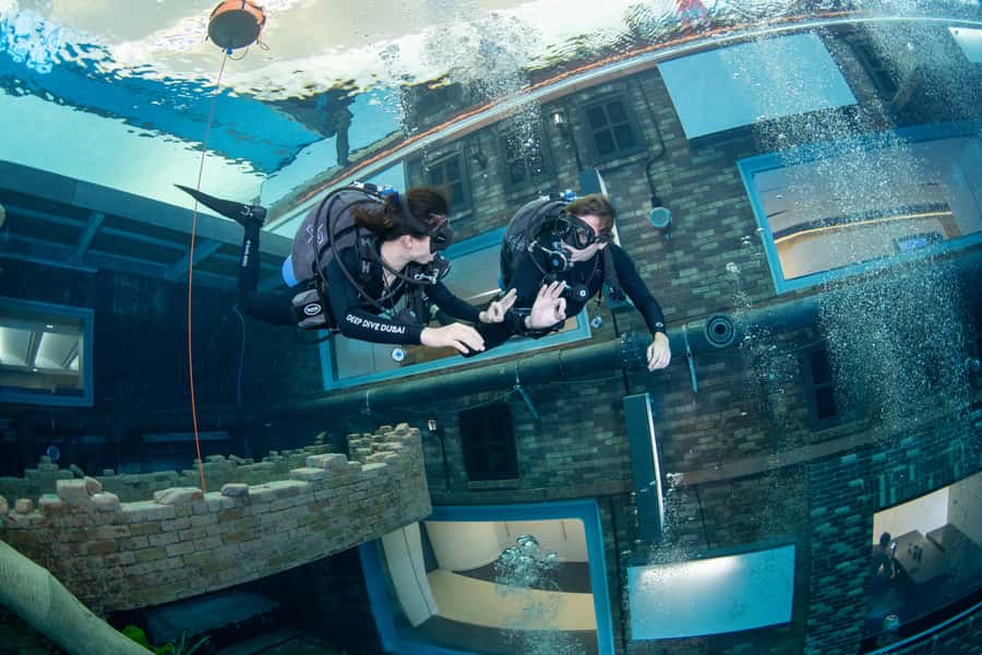 Dubai: Discover Scuba Dive for Beginners at Deep Dive - Reaching 12 meters inside a sunken city