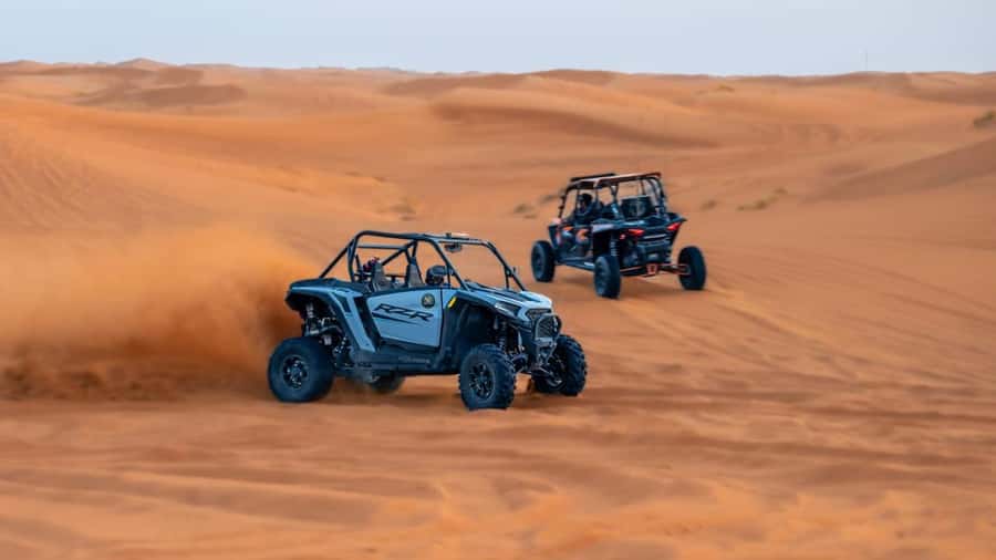 Dubai: Dune Buggy Safari and Camel Ride with Transportation - Taking the wheel in Dubai’s red desert