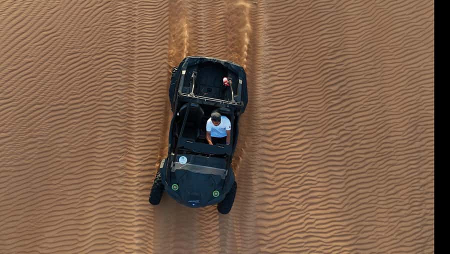Dubai: Dune Buggy Safari and Camel Ride with Transportation - Sandboarding and the short camel ride