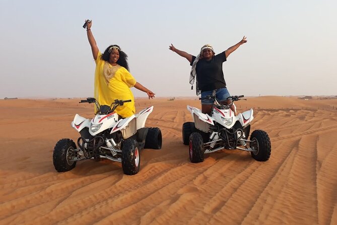 Dubai Dunes Safari With Quad Bike, Camel Ride, BBQ Dinner & Live Shows - Sandboarding and the quiet camel ride