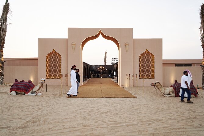 Dubai Evening Desert Safari BBQ Dinner & Transfer to Noble Camp - Sandboarding and sunset on the red sand