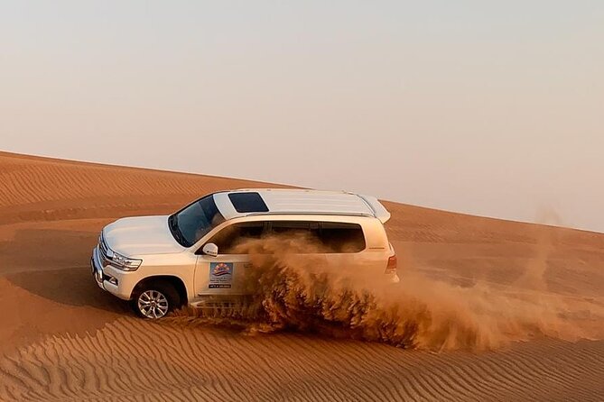 Dubai Evening Desert Safari with BBQ & Live Entertainment - A short camel ride, Arabic coffee, and dates