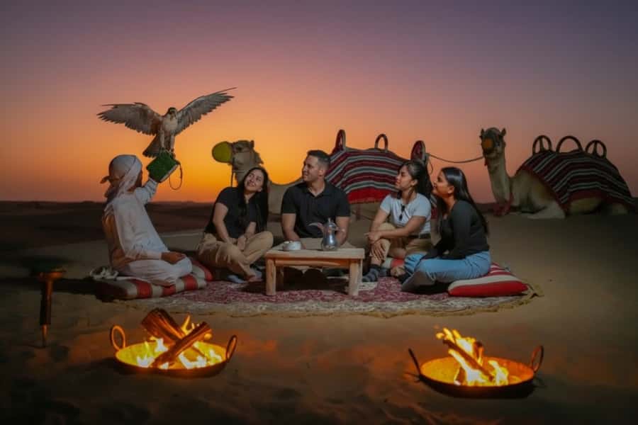Dubai: Evening Desert Safari with Camel Ride & Stargazing - Red dunes, sunset photos, and dune driving