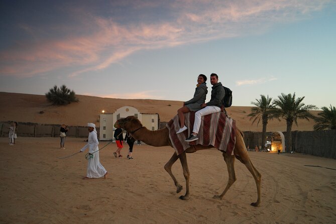 Dubai Evening Desert Safari with Thrilling Dune Buggy Adventure - Tea, dates, and a traditional-style camp