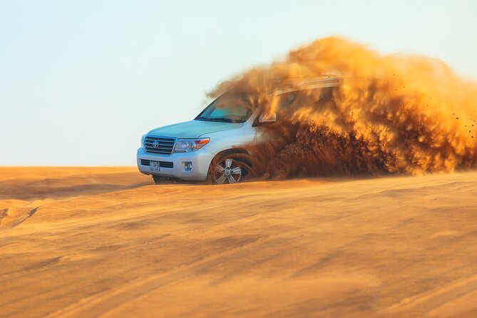 Dubai Evening Desert Safari With Transfers Dune Bashing & Dinner - Lahbab’s optional quad bikes and dune buggies