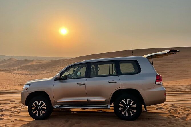 Dubai Evening Desert Safari With Transfers Dune Bashing & Dinner - What the $62.52 price really covers