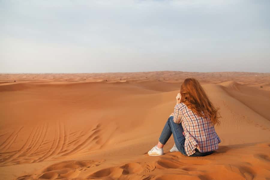 Dubai: Evening Tour with Quad Biking, Camel Ride, and BBQ - Sandboarding with a view