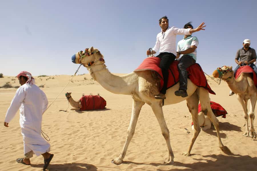 Dubai: Evening Tour with Quad Biking, Camel Ride, and BBQ - The camel ride: traditional, but short